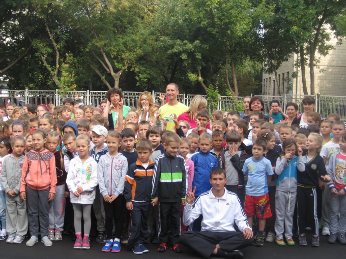  Olympic games medalist Denis Silant'ev and TM Dobryana doing exercises with the kids of  Kiev schools.